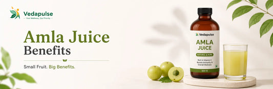 Amla juice benefits shown with fresh Indian gooseberries and a glass of juice